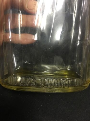 https://bndtreasurechest.com/wp-content/uploads/imported/2/92/Vintage-Clear-Glass-Bottle-45-Quart-w-Lid-Federal-Law-Forbids-SaleRe-Use-263130725592-6.jpg